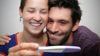 couple viewing pregnancy test